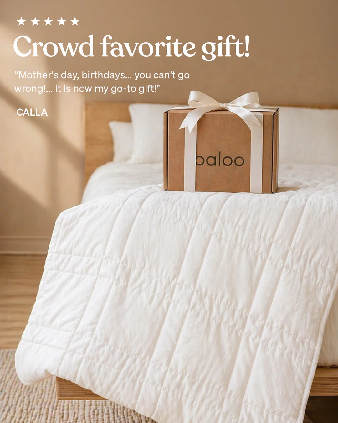 Gift box with a white ribbon on a bed with a white quilt. Text reads: Crowd favorite gift! Quote praises it for occasions. Cozy mood.